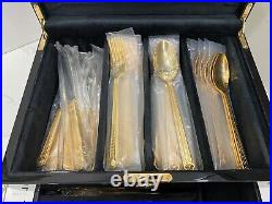 48 piece Versace Medusa Gold Gilded Flatware Set by Rosenthal in a Versace