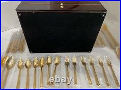 48 piece Versace Medusa Gold Gilded Flatware Set by Rosenthal in a Versace