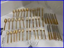 48 piece Versace Medusa Gold Gilded Flatware Set by Rosenthal in a Versace