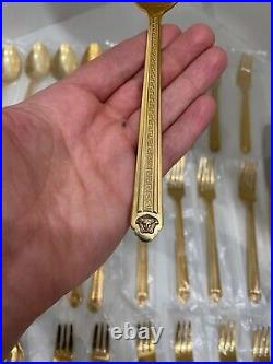 48 piece Versace Medusa Gold Gilded Flatware Set by Rosenthal in a Versace