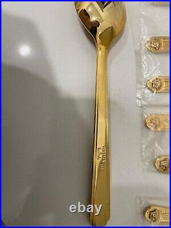 48 piece Versace Medusa Gold Gilded Flatware Set by Rosenthal in a Versace