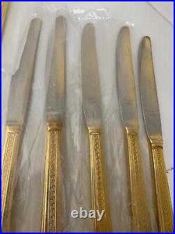 48 piece Versace Medusa Gold Gilded Flatware Set by Rosenthal in a Versace