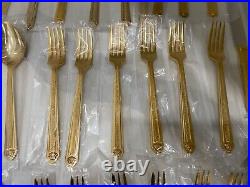 48 piece Versace Medusa Gold Gilded Flatware Set by Rosenthal in a Versace