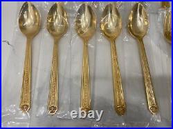 48 piece Versace Medusa Gold Gilded Flatware Set by Rosenthal in a Versace