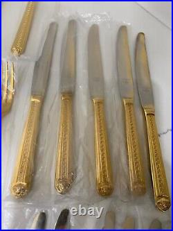 48 piece Versace Medusa Gold Gilded Flatware Set by Rosenthal in a Versace