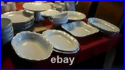 58 piece White with Gold accents Porcelain Dinner and Coffie service by Chodziez