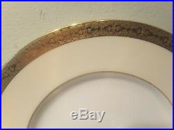 A Set of Eight Minton H3706 Gold Encrusted Dinner Plates