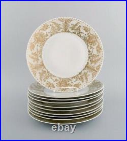 Bjørn Wiinblad for Rosenthal. 10 dinner plates in porcelain with gold decoration