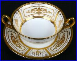 Complete service for 12 of Minton for Tiffany Neoclassical Style Gilded Plates