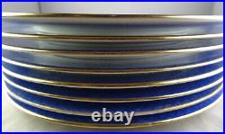 Eight Copeland Porcelain Blue Willow Dinner Plates with Gold Trim
