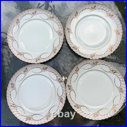 Elegance Rose set of four dinner plates by Royal Tettau. Pink with Gold trim