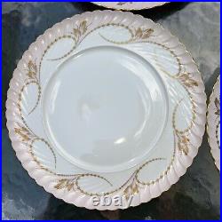 Elegance Rose set of four dinner plates by Royal Tettau. Pink with Gold trim