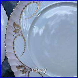 Elegance Rose set of four dinner plates by Royal Tettau. Pink with Gold trim