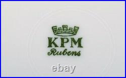 KPM, Denmark. 12 Rubens dinner porcelain plates with floral motifs, gold edge