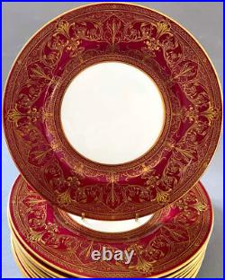 Rare Collection of 12 Royal Worcester Burgandy and Gold Hand Gilded Plates