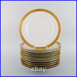 Royal Copenhagen Dagmar, White. 12 porcelain dinner plates with gold edge