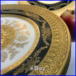 Set of 9 Hutschenreuther Gold Encrusted & Black Rim Dinner Plates